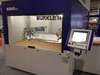 Automated base and top coating machine. Spray booth