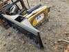 Skid steer rock hammer