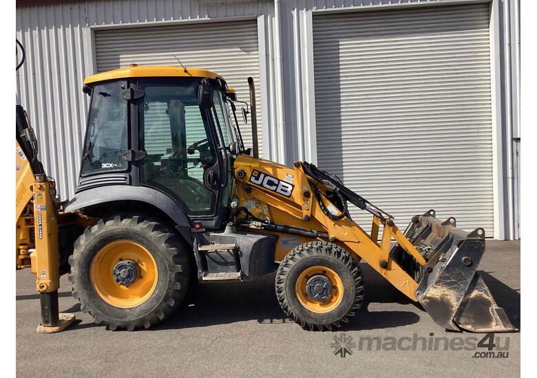 caption JCB 3CX Backhoe