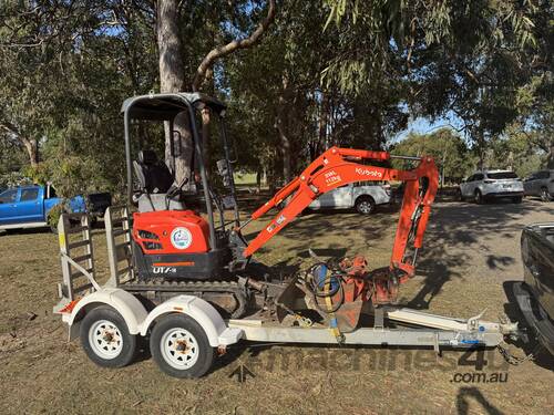 caption Kubota U17-3 Mini Excavator + Trailer Package