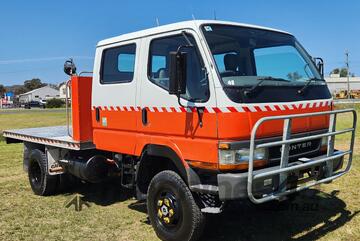 Mitsubishi Fuso Canter FG 4x4 Dualcab TraytopTruck. Ex NSW Rural Fire Service.