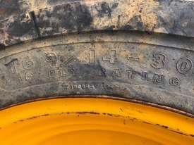 Massey Ferguson 860 Backhoe rear drive tyre & rim  - picture1' - Click to enlarge