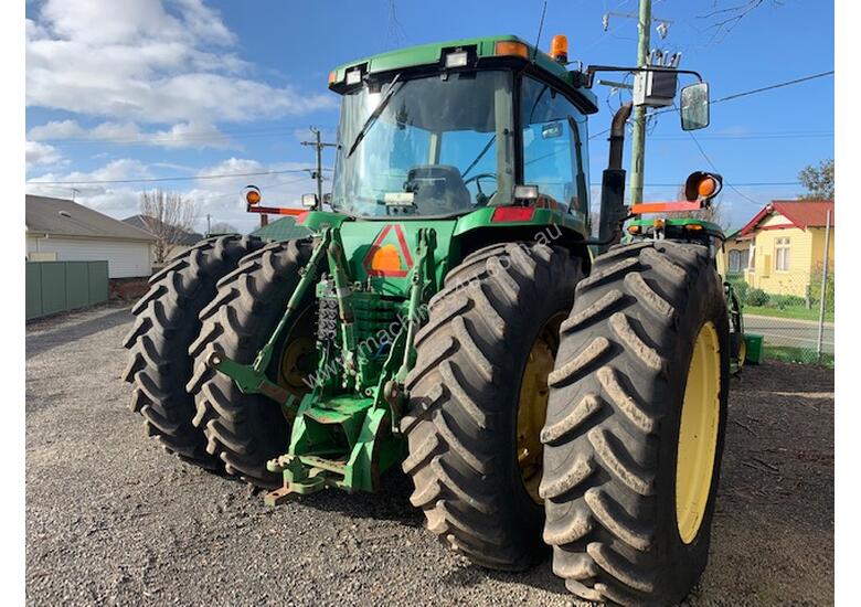 caption John Deere 8110 Large Frame Row Crop Tractor