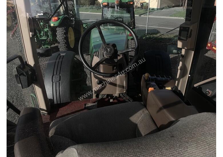 caption John Deere 8110 Large Frame Row Crop Tractor