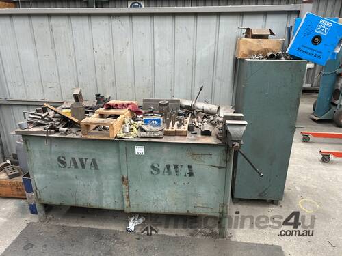 caption Steel Fabricated Workbench With Vice + Adjacent Storage Cabinet