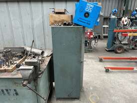 Steel Fabricated Workbench With Vice + Adjacent Storage Cabinet - picture0' - Click to enlarge