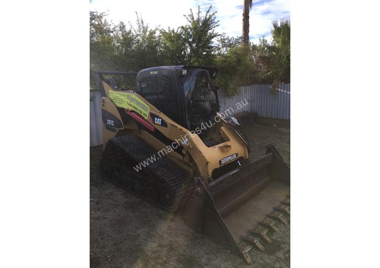 caption Used CAT 297C Skid Steer
