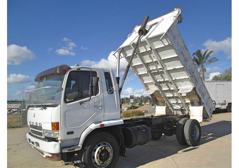 caption Mitsubishi FM 10.0 Fighter Tipper Truck
