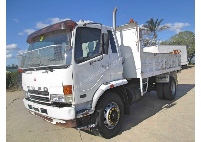 caption Mitsubishi FM 10.0 Fighter Tipper Truck