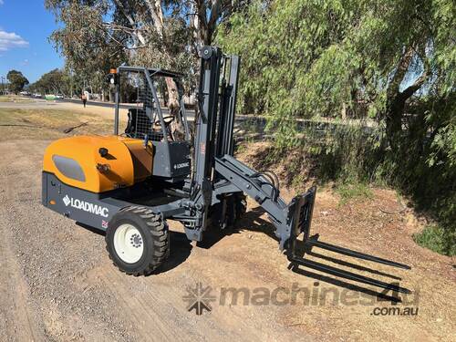 caption Loadmac 825 Super Reach One Side Unload - Made in Britain Built for Australia