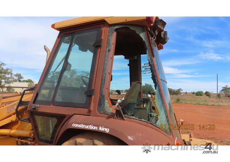 caption 580K CASE Backhoe