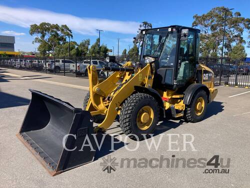 caption CAT 907M Wheel Loaders integrated Toolcarriers