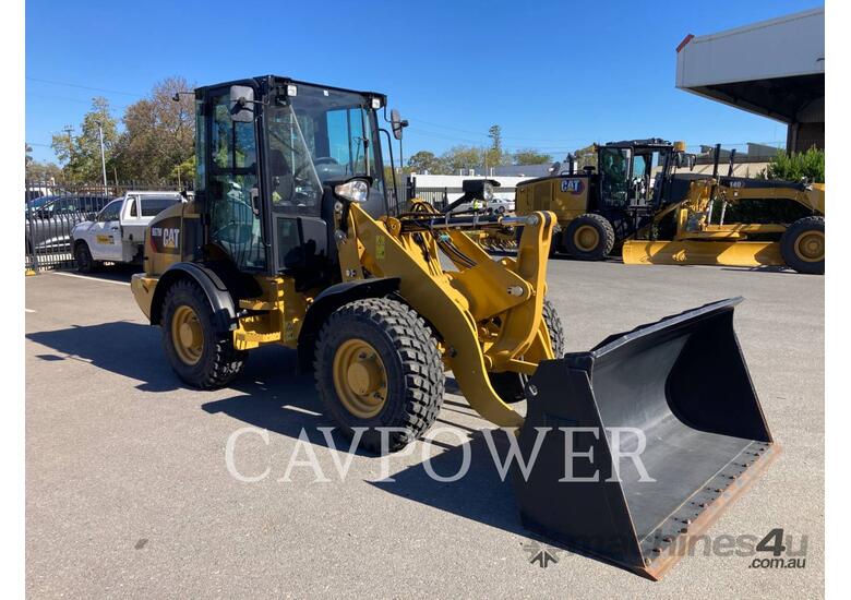 caption CAT 907M Wheel Loaders integrated Toolcarriers