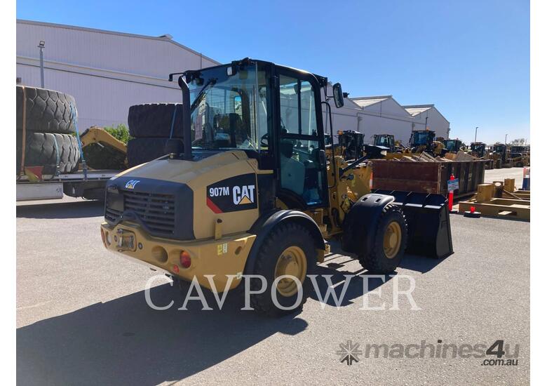 caption CAT 907M Wheel Loaders integrated Toolcarriers