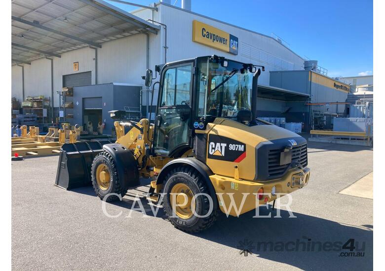 caption CAT 907M Wheel Loaders integrated Toolcarriers