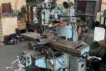 Turret milling machine- slotting head attachment