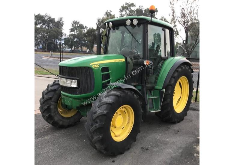 caption John Deere 6330 Premium Cab IN VIC