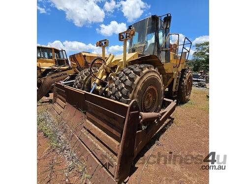caption 2010 CAT 824G Wheeled Dozer