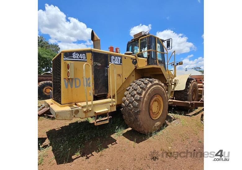 caption 2010 CAT 824G Wheeled Dozer