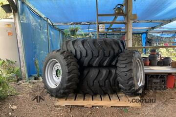 as new tractor tyres and rims to suit small case or boomer 35
