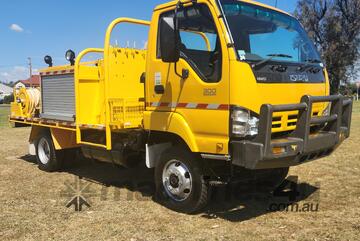 Isuzu NPS300 4x4 Turbo Diesel Single Cab Traytop Firetruck. Ex QLD Fire & Rescue Service. Isuzu NPS300 4x4 Turbo Diesel Single Cab Traytop Firetruck. Ex QLD Fire & Rescue Service.