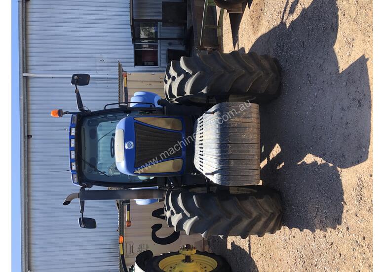 caption New Holland TG285