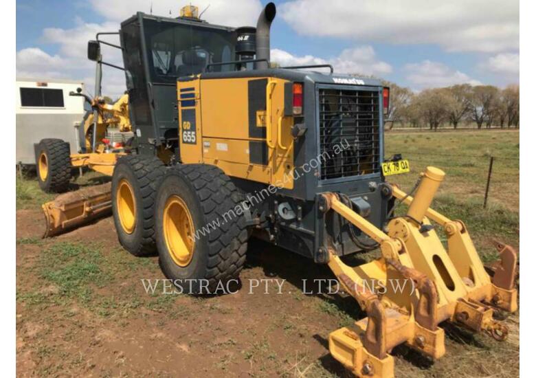 caption KOMATSU GD655 Motor Graders