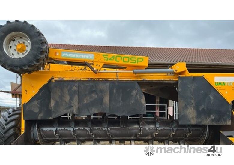 caption MECBIO - MENART Tow-Behind Windrow Turner