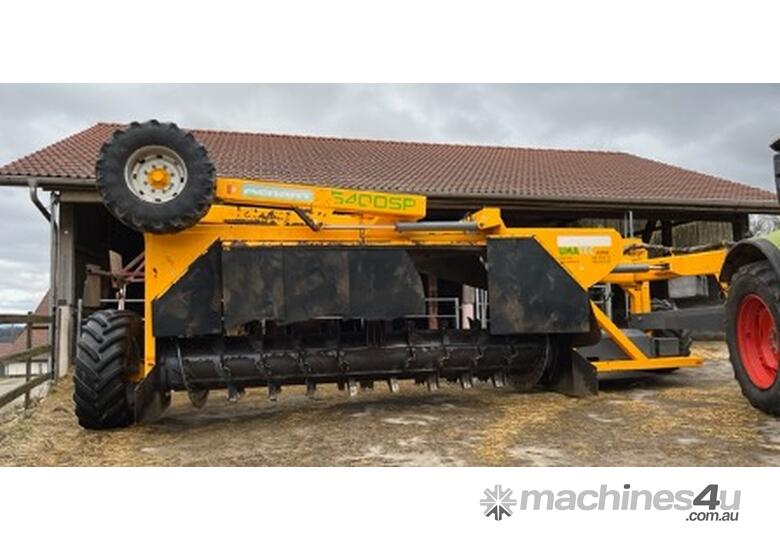 caption MECBIO - MENART Tow-Behind Windrow Turner