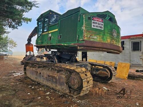 caption 2007 JOHN DEERE 909J HARVESTER WITH SOUTHSTAR HEAD