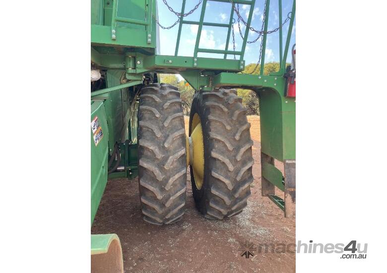 caption JD S670 HARVESTER