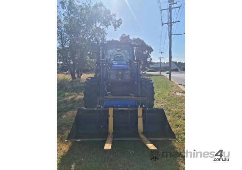 caption New Holland T6020