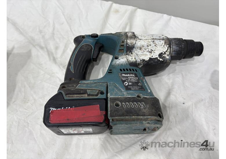 caption Makita Hammer Drill and Blower (Police Lost & Stolen)
