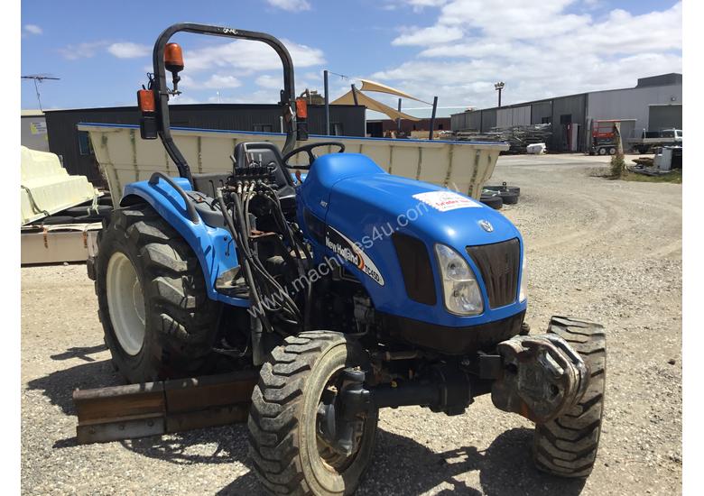 caption New Holland Compact Grader