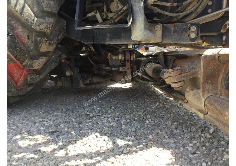 caption New Holland Compact Grader