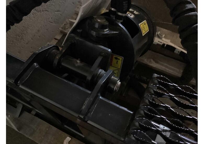 caption skid steer auger