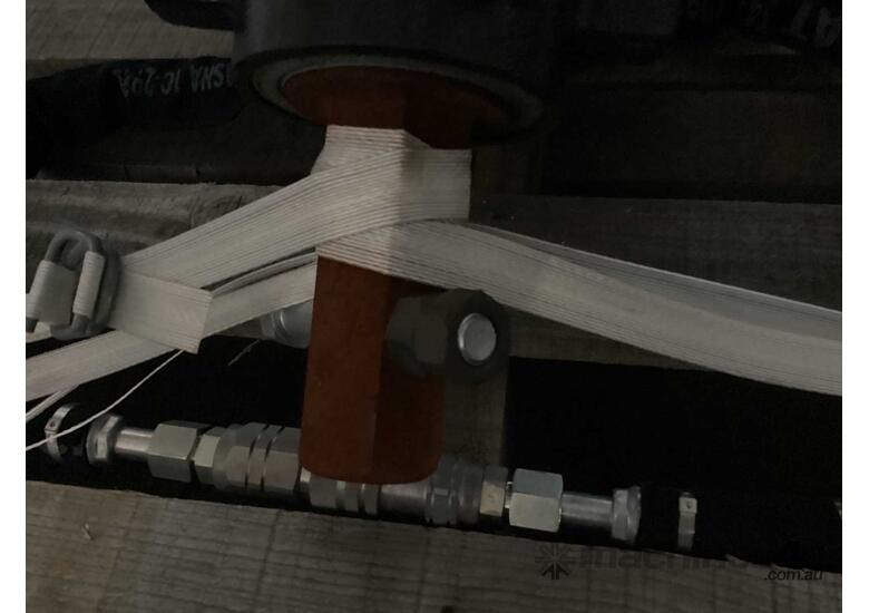 caption skid steer auger