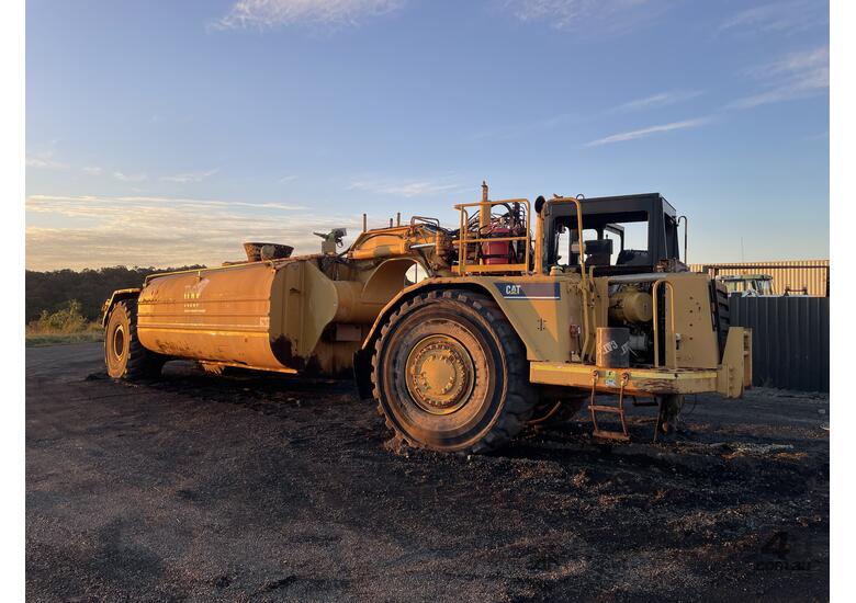 caption Caterpillar 621G Water Wagon Tanker