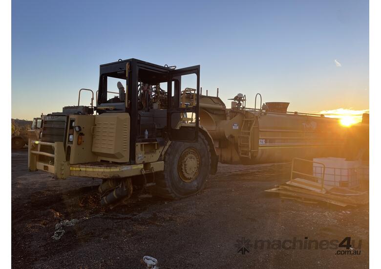 caption Caterpillar 621G Water Wagon Tanker