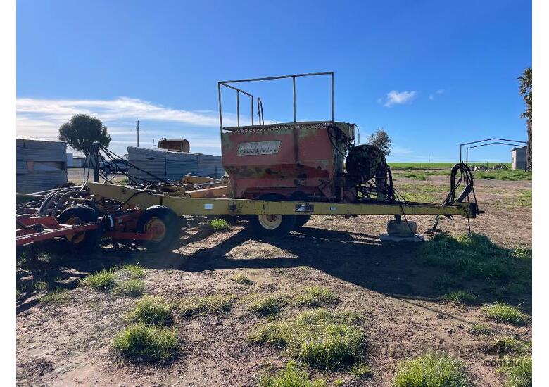 caption Alfarm Airseeder, cart and bar.