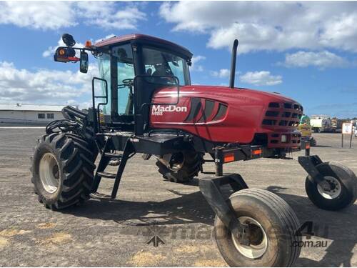 caption Macdon M155 Windrower & 30ft Front on Trailer