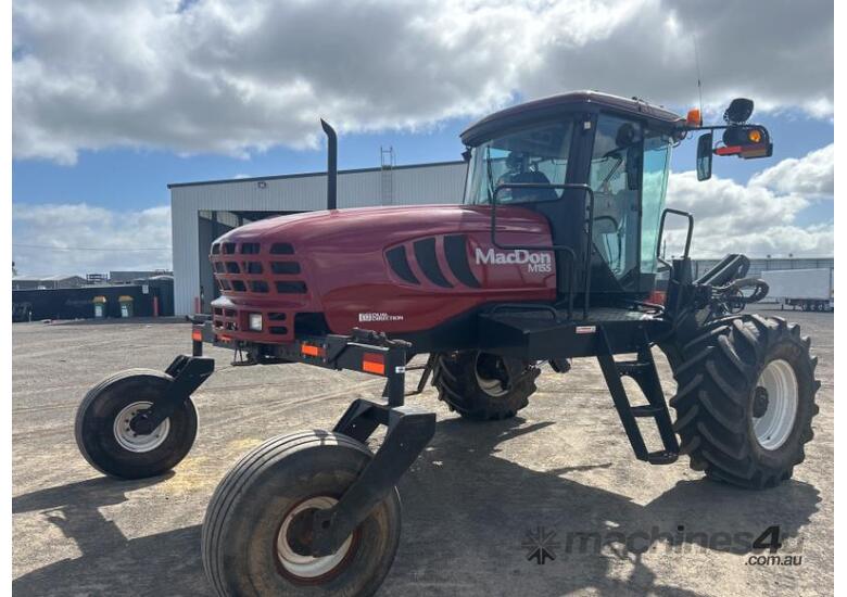caption Macdon M155 Windrower & 30ft Front on Trailer