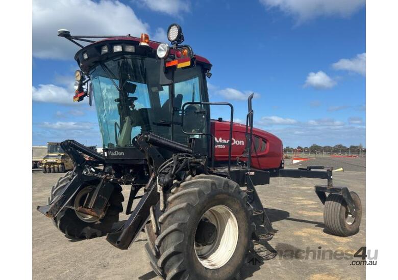 caption Macdon M155 Windrower & 30ft Front on Trailer