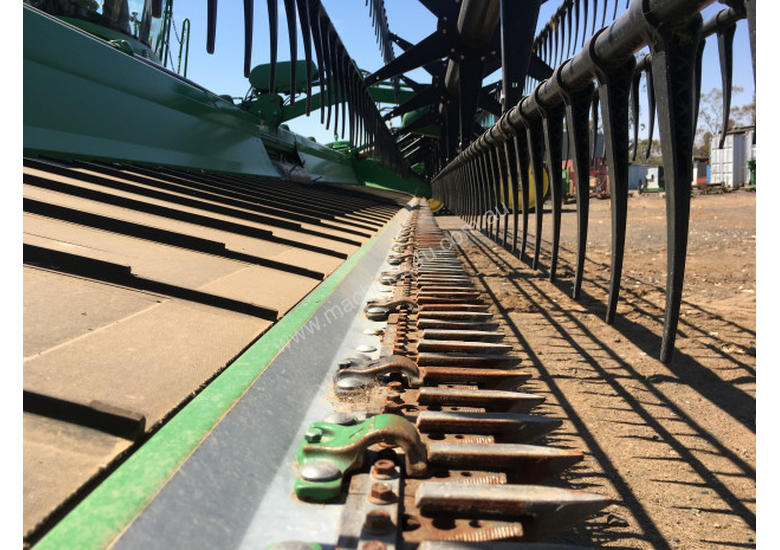 caption John Deere 740D Header Front Harvester/Header