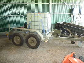 Heavy duty ex army twin axle trailer with 1000 liter water tank, and pump - picture0' - Click to enlarge