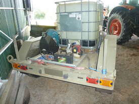 Heavy duty ex army twin axle trailer with 1000 liter water tank, and pump - picture0' - Click to enlarge