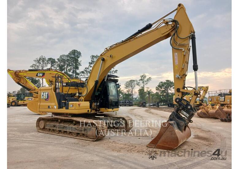 caption CAT 320-07 Track Excavators