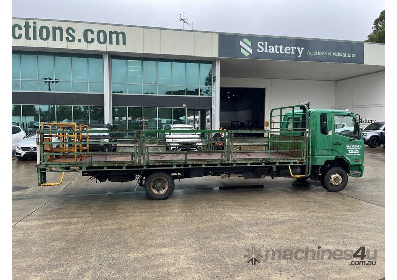 caption 2010 Fuso Fighter FK 600 4x2 Tray Truck W/Tailgate Lift
