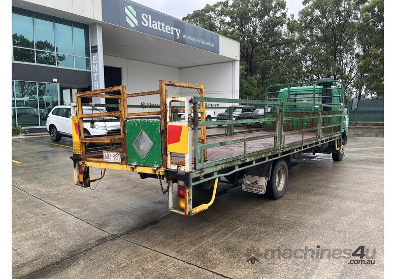 caption 2010 Fuso Fighter FK 600 4x2 Tray Truck W/Tailgate Lift