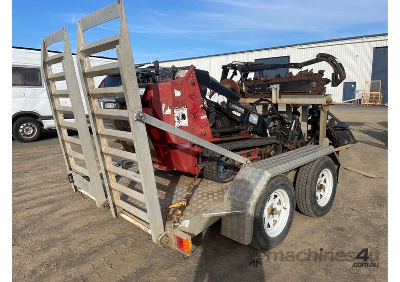caption 2011 Toro TX525 Wide Track Stand Behind Mini Digger & Trailer Combination